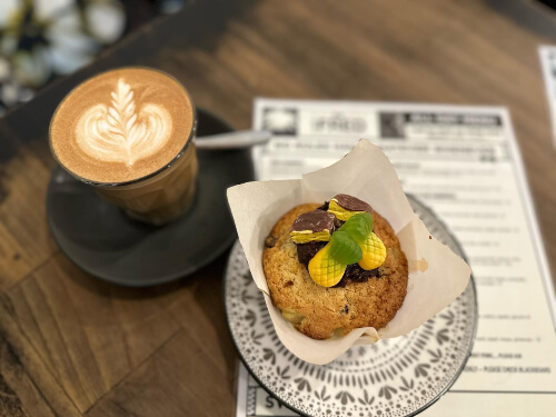 Morning magic of coffee and muffin at Cafe Fred