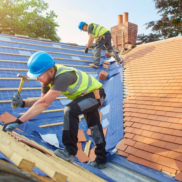 Roofing Guys Sydney installing a new tiled roof with expert care and precision. We handle new roofs for renovations extensions and new builds across Sydney